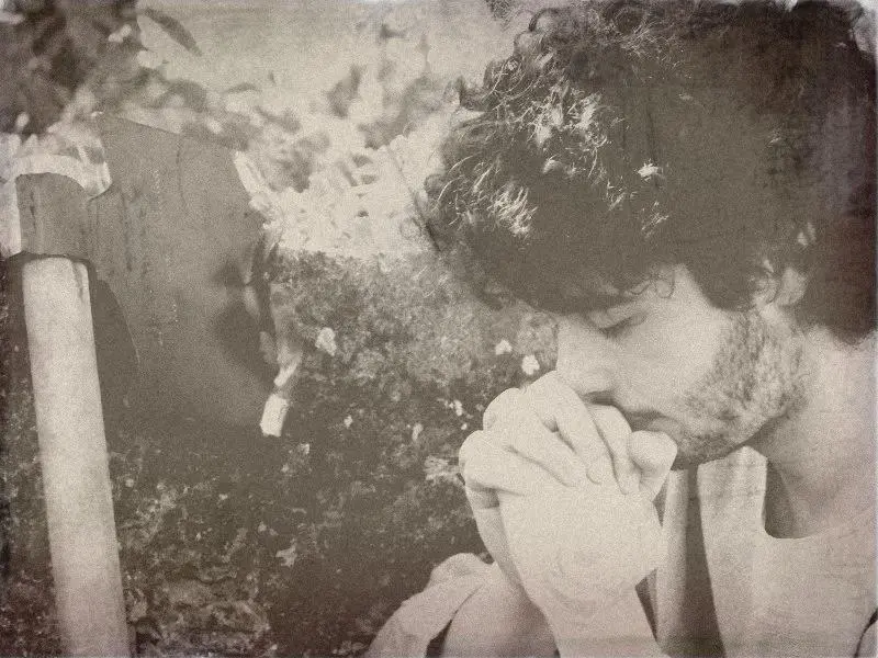 Giovanni in prayer in his darkest hour — historical reenactment