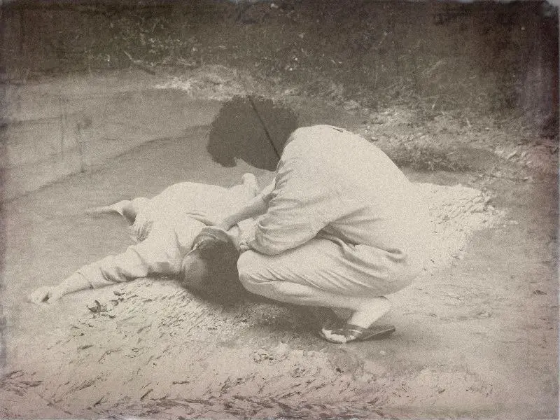Giovanni checks on the body — historical reenactment